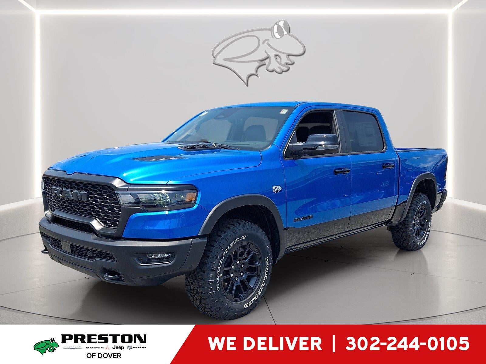 2026 RAM 1500 Rebel in Hydro Blue Pearlcoat — front three-quarter view