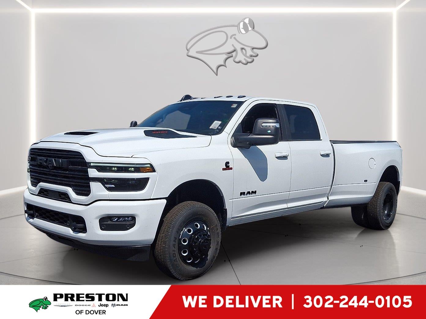 2026 RAM 3500 Laramie in Bright White Clearcoat — front three-quarter view