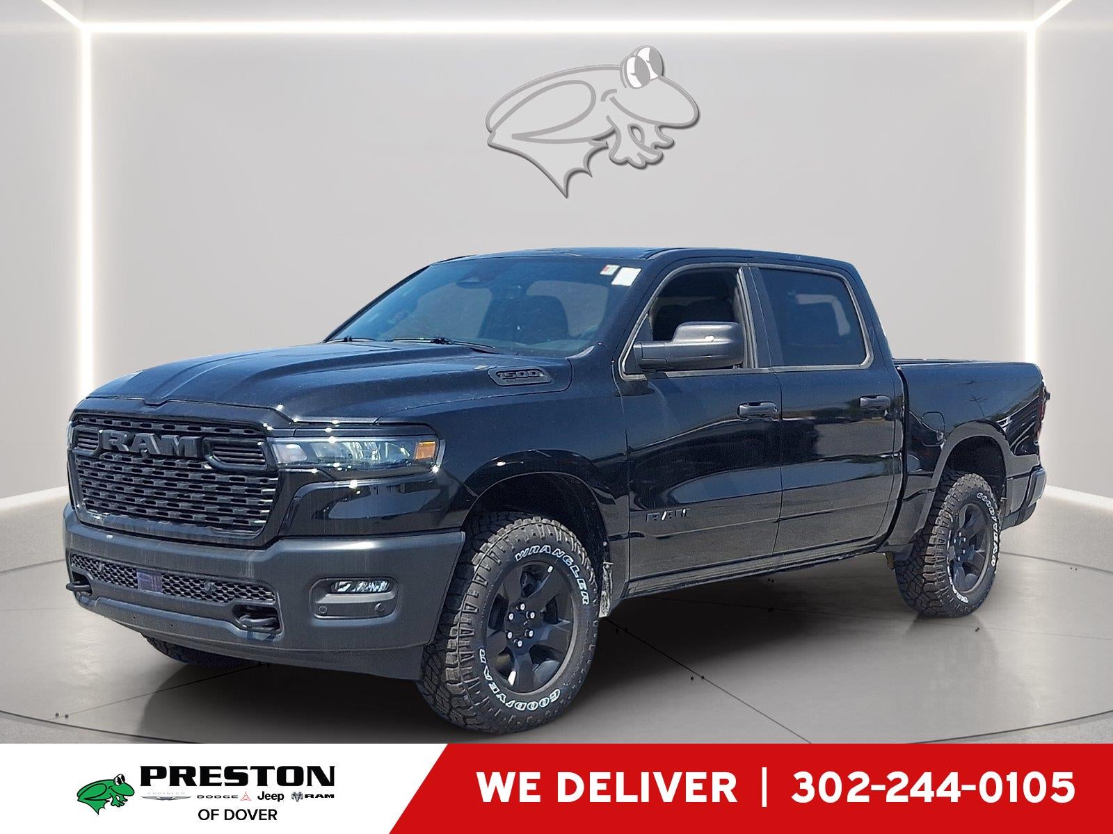 2026 RAM 1500 Warlock in Diamond Black Crystal Pearlcoat — front three-quarter view